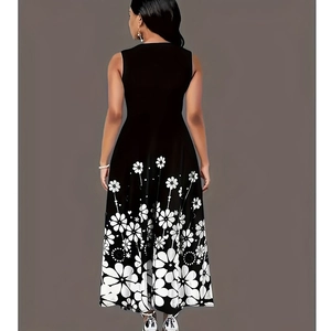 Detail of white daisy floral print on the hem of a black sleeveless maxi dress