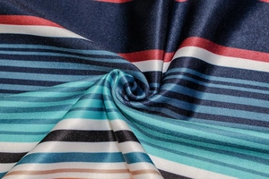 Macro detail of colorful striped polyester fabric with fine knit texture and sheen