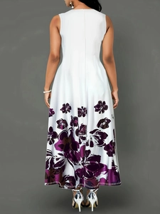 Back view of a sleeveless white maxi dress featuring elegant purple floral print at the hem