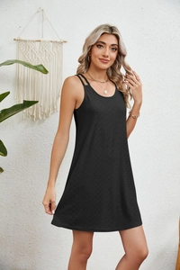 Detail of black sleeveless A-line dress with hollow jacquard texture and double straps