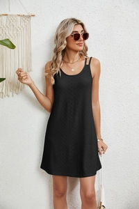 Detailed view of black sleeveless eyelet dress with elegant double shoulder straps