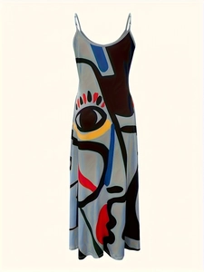 Macro view of digital abstract art face print and v-neck detail on a summer maxi dress