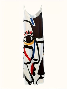 Detail of artistic abstract face print on a white sleeveless summer maxi dress