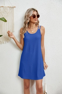 Detail of royal blue A-line mini dress with geometric eyelet lace and thin double straps