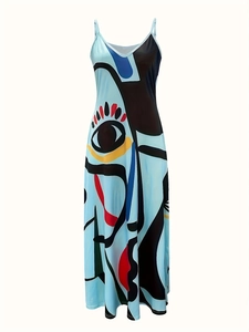 Vue détaillée d'une robe longue pour femme avec imprimés yeux pop art et texture satinée