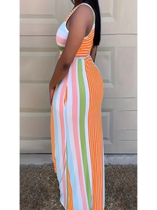 Vestito lungo senza maniche a righe da donna con motivi verticali e orizzontali colorati