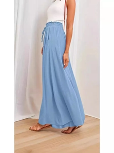 High-waisted light blue wide-leg trousers with drawstring and light textured fabric