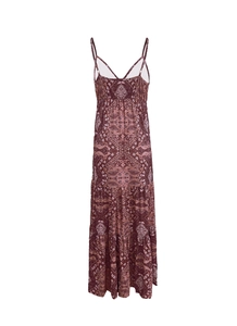 Detail of bohemian maxi dress with paisley prints, spaghetti straps and tiered skirt
