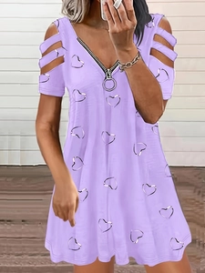 Detail of light purple cold shoulder dress with silver ring zipper and heart print