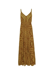 Detailed view of bohemian floral print and tiered skirt construction on a maxi dress