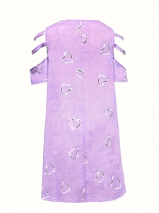 Detail of lavender cold shoulder dress with white heart print and crisscross sleeve ties