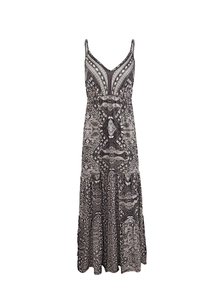 Detail of bohemian paisley print on tiered maxi dress with V-neck and mesh insert