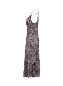 Detail of bohemian spaghetti straps and tiered print layers on this long dress