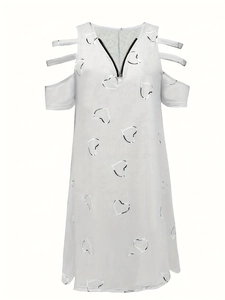 Detail of white cold-shoulder dress with zipper neckline and silver heart pattern