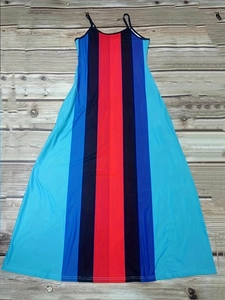 Close-up of lightweight maxi dress featuring colorful vertical stripes and thin straps