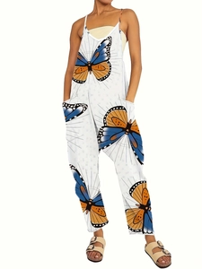 Detail of white wide-leg jumpsuit with blue and orange butterfly print and deep pockets