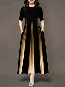 Detail view of A-line dress featuring golden radial stripes and side pockets on black fabric