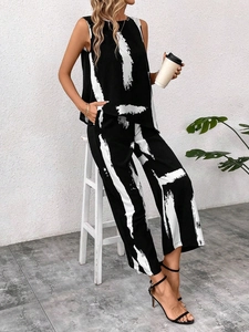Women's 2-piece set featuring sleeveless round neck top and wide leg pants with brush print