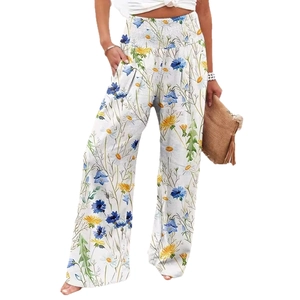 Floral wide leg trousers for women with high smocked waist and blue bellflower print