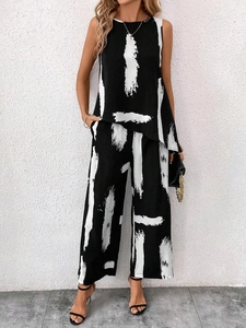 Women's 2-piece set featuring sleeveless asymmetric brushstroke print top and wide-leg pants
