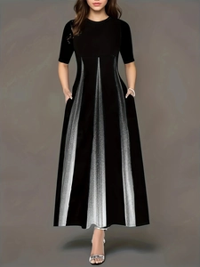 Elegant black plus size maxi dress with silver metallic pleats and round neckline
