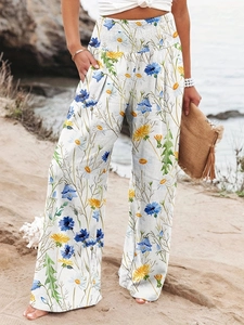 Pantalon large pour femme avec imprimés floraux bleus et jaunes et taille haute froncée