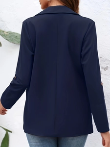 Detail showing the back seam and adjustable button cuffs on this navy slim fit blazer
