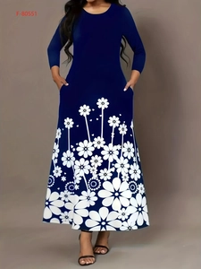 Robe longue bleu marine à manches longues avec imprimé floral blanc sur l'ourlet