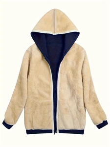 Detailed view of plush beige fleece jacket with contrast navy blue zip and ribbed cuffs