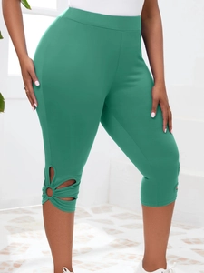Leggings 7/8 vert foncé à taille haute pour femmes avec détails floraux ajourés