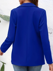 Rear view of vibrant blue slim fit blazer jacket showing back seam and buttoned sleeves
