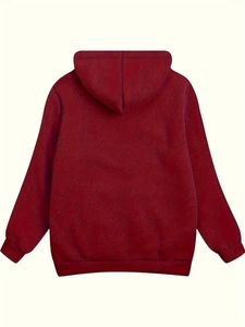 Detail of ribbed cuffs and hem on a plus-size burgundy oversized fleece hoodie