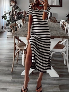 Detail view of V-neck striped maxi dress with side split design in cotton blend