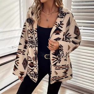 Detail of bohemian geometric print on cozy fleece hooded jacket with deep side pockets