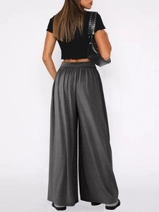 Vue arrière du pantalon de danse gris foncé à jambes larges et taille haute élastiquée