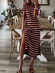 Pink and black striped V-neck maxi dress with side slits for a casual summer holiday look