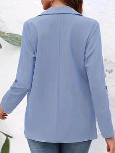 Rear view of a light blue slim-fit blazer with notched lapel and brown cuff buttons