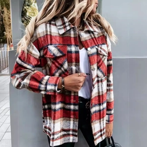 Women's plaid flannel shacket with front buttons and chest pockets in red and brown