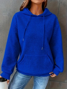 Royal blue hooded sweatshirt with waffle texture and kangaroo pocket for women