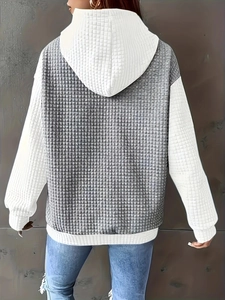 Women's loose hoodie with grey-white color blocking and textured waffle knit pattern