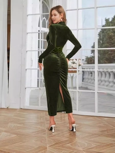 Elegant dark green velvet long sleeve bodycon dress with ruching and high slit details