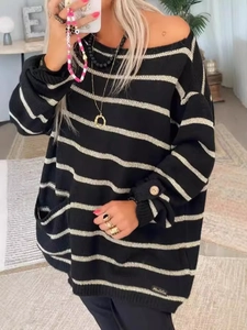 Oversized black and white striped knit sweater with crew neck and side pockets for women
