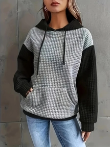 Women's waffle texture hoodie with gray and black color block patchwork design