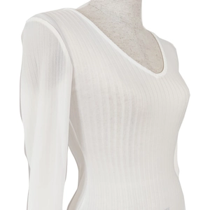 Close-up of white rib-knit fabric texture on long-sleeve V-neck bodysuit for women