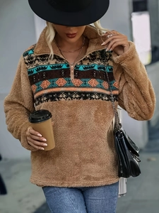 Women's brown fleece pullover with half-zip stand collar and geometric tribal patterns