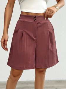Women's high waist wide leg shorts in dusty pink with double button and crinkle texture
