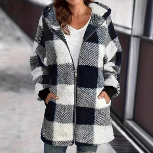 Detail of checkered plush hoodie jacket featuring soft faux fur texture and ribbed cuffs