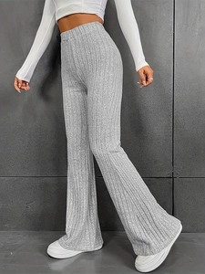 Women's high waist flared knit trousers in light grey with vertical ribbed texture
