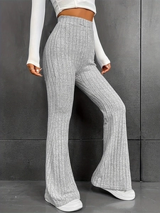 Women's chic grey high-waisted ribbed flare trousers with a slim fit silhouette