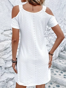 Back view of white cold-shoulder hollow-out embroidery mini dress for summer vacation